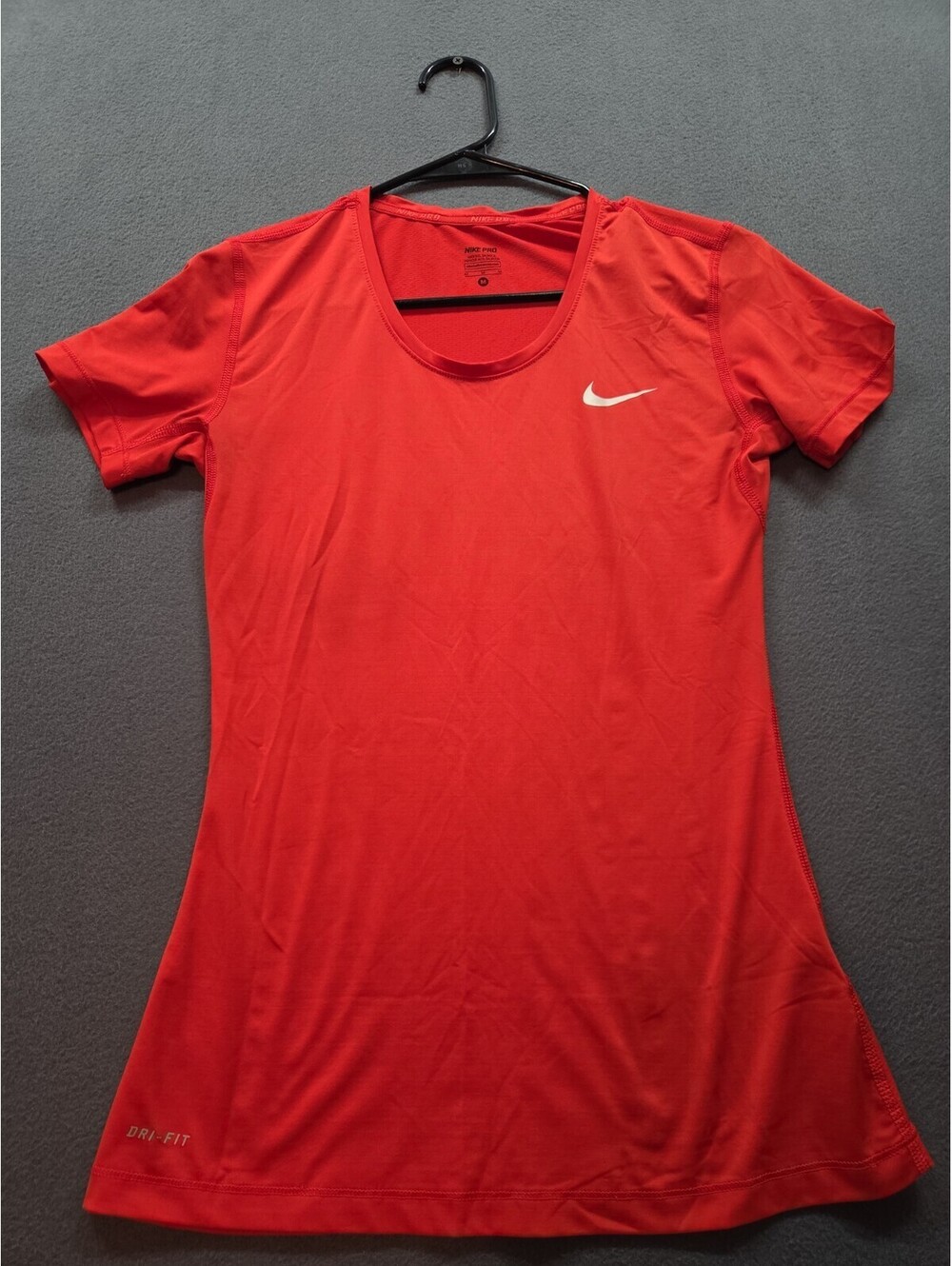women's red Nike Pro shirt size M